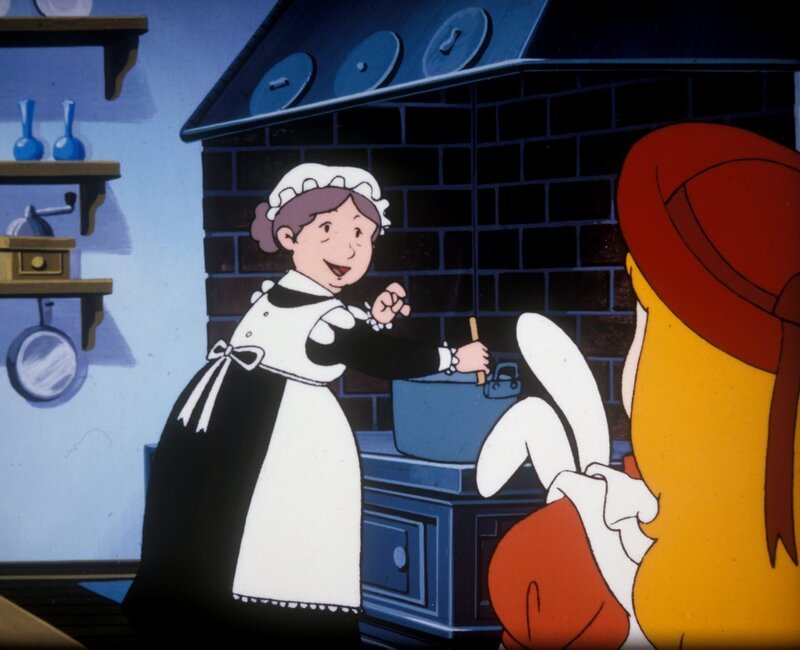 Mrs. Spiceham, die Köchin, zeigt Alice wie man Karamelbonbons macht. – Bild: ORF/​Apollo Filmverleih