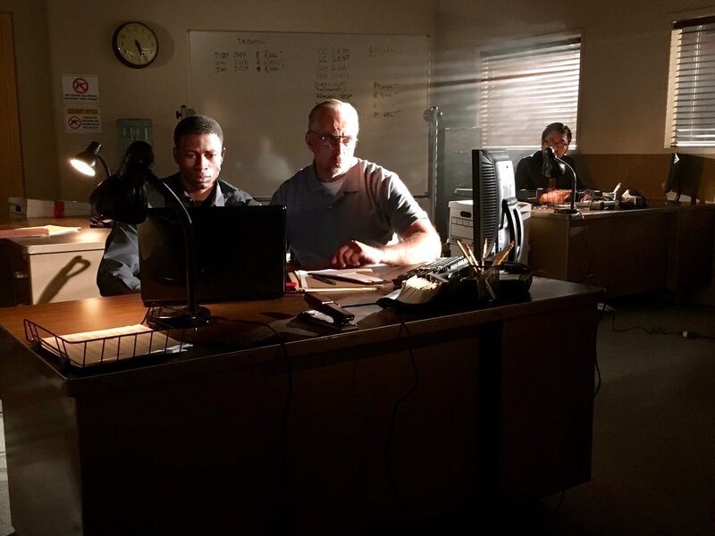 Commander Filenko speaking with detective about Joe’s explorer group budget. – Bild: Discovery Communications