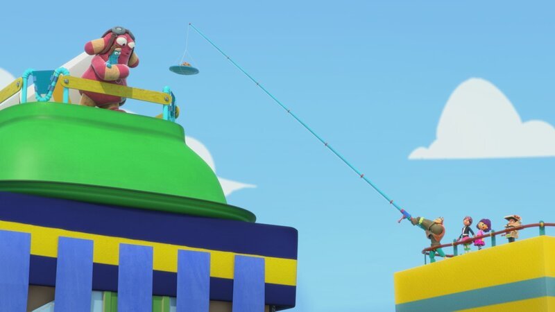 Die Freunde haben alle Hände voll damit zu tun, Riesen-Pop vom Hochhaus runterzulocken. – Bild: KiKA/​BBC/​Boat Rocker Rights Inc. MMXVIII