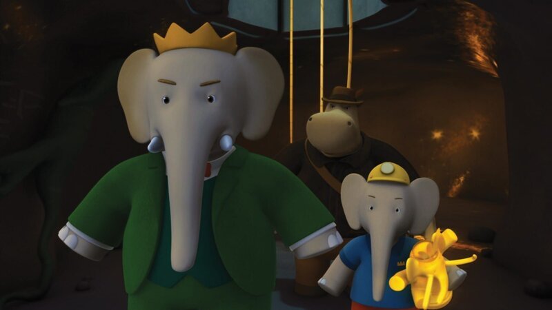 König Babar und Heldopotamus eilen Badou zu Hilfe. Prospero ist aufgetaucht. – Bild: KI.KA/​Nelvana Limited
