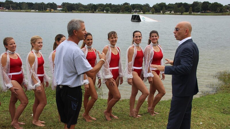 Host Anthony Melchiorri meets with the Cypress Gardens Water Ski team after their show in Winter Haven, Fl, as seen on Travel Channel’s Hotel Impossible. – Bild: The Travel Channel, L.L.C.
