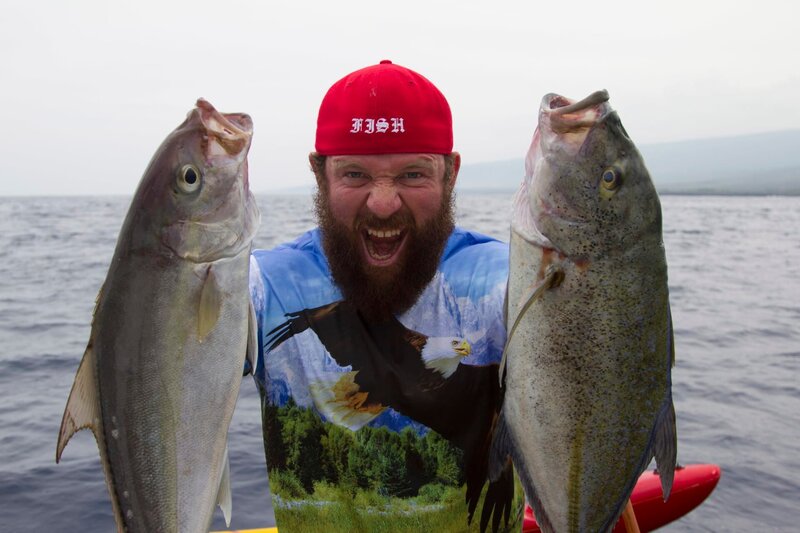 Eric holding two fish. – Bild: Discovery Communications, Inc. For Show Promotion Only