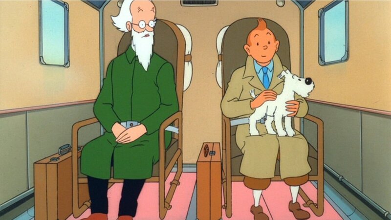 Tim (r.) begleitet den vermeintlichen Professor Janus (l.) als dessen persönlicher Sekretär nach Syldavien, unwissend über die drohenden Gefahren und Intrigen. Struppi ist ebenfalls als treuer Wegbegleiter dabei. – Bild: ZDF und Ellipsanime/​France 3/​M6/​Nelvana