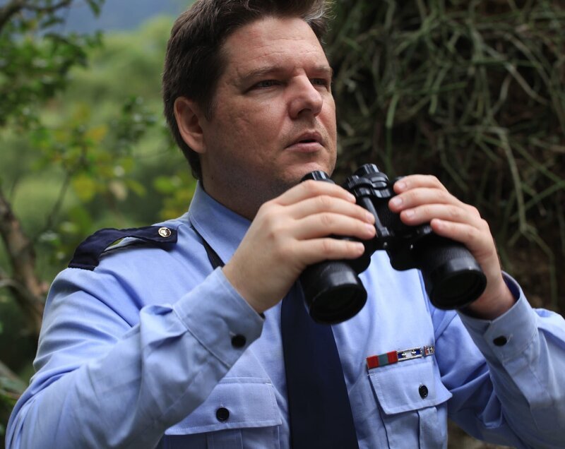 Sgt. Bellanger (played by Sidy Correa) surveys the area. – Bild: Cineflix