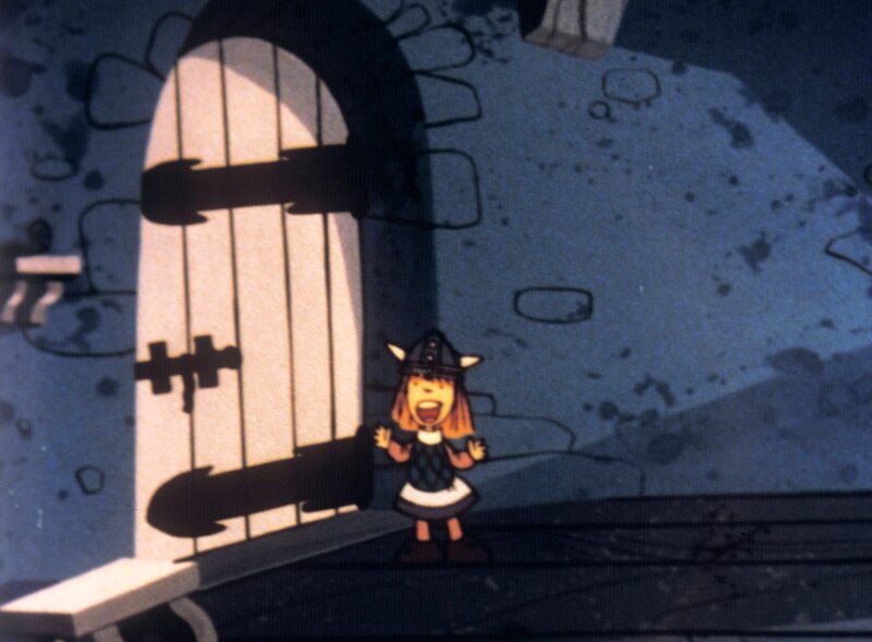 Wickie muss schon recht laut schreien, dami ihn der Gefängniswärter draussen vor der Tür verstehen kann. – Bild: ORF/​Apollo Filmverleih