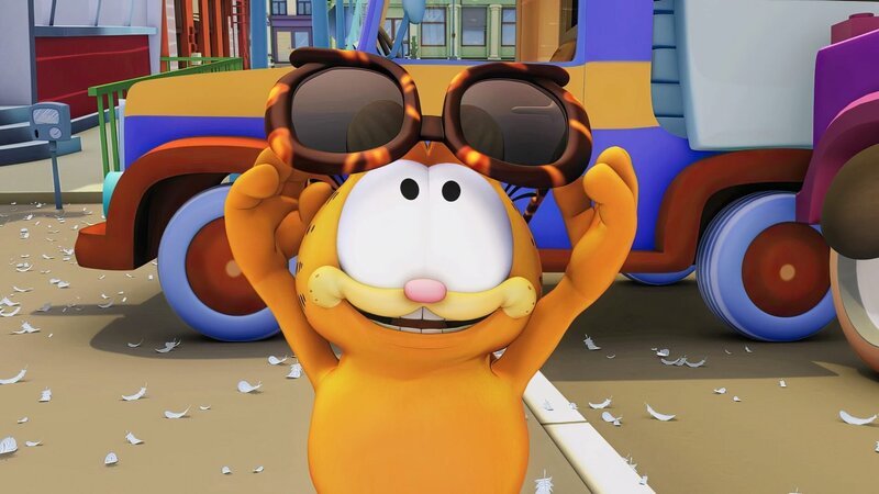 Garfield betrachtet neugierig die Zukunftsbrille. – Bild: ORF/​Mediatoon/​Dargaud Media/​Paws Inc.