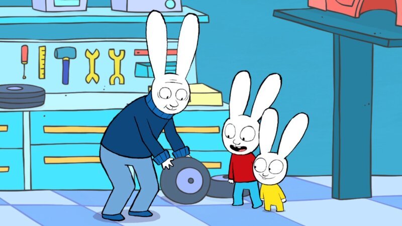 Franz (r.) und Simon (M.) dürfen Opi (l.) beim Reifenwechsel in der Werkstatt helfen. – Bild: ZDF