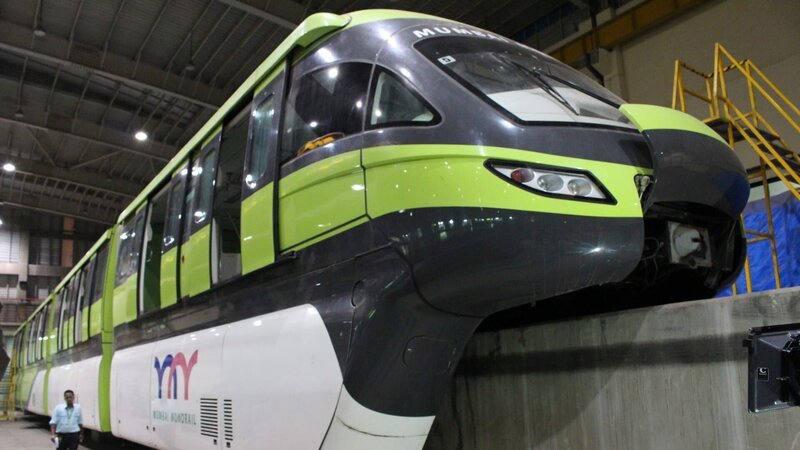 Close up of monorail train from below, in waiting bay. – Bild: Discovery Communications