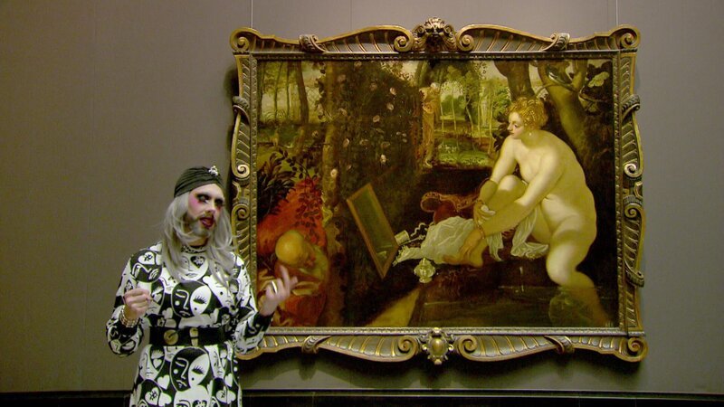 Kunsthistoriker Ben /Drag Queen „Tiefe Kümmernis“ vor dem Bild „Suasanna im Bade“ im Kunsthistorischen Museum – Bild: 3sat Kunsthistoriker Ben /Drag Queen „Tiefe Kümmernis“ vor dem Bild „Suasanna im Bade“ im Kunsthistorischen Museum – Bild: 3sat