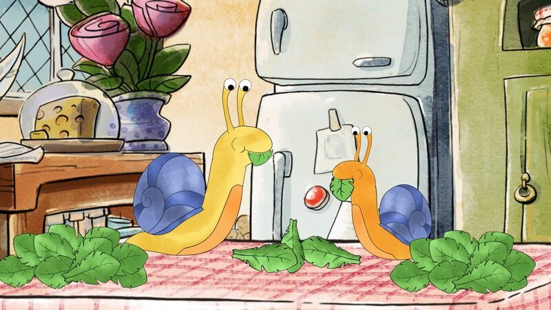 Schnecki und die kleine Schnecke verputzen leckere Salatblätter. – Bild: MDR/​WunderWerk