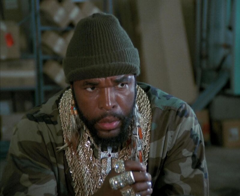 Das A-Team hilft einem kleinen Lieferservice, der von einem skrupellosen Müllabfuhr-Unternehmer brutal unter Druck gesetzt wird. Bild: B.A. (Laurence Tureaud). – Bild: Stephen J. Cannell Productions