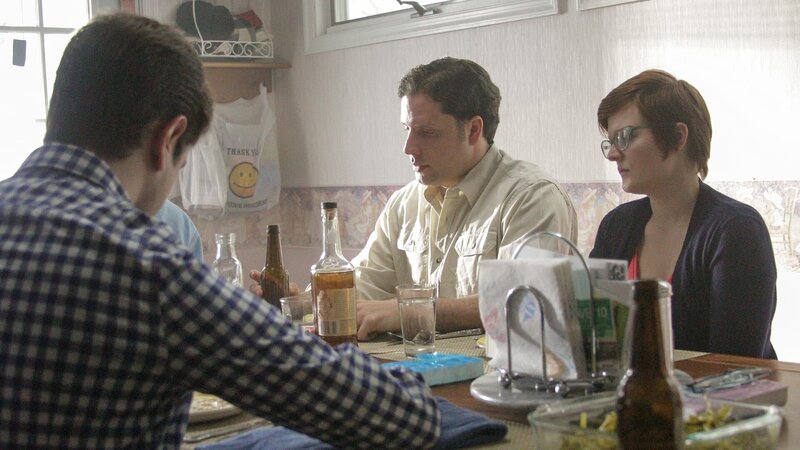 Taylor, Danny McCrary and Carl Taylor sitting at table during reenactment. – Bild: Discovery Communications