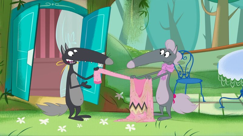 Stolz überreicht Wolf seiner Wolfine den wärmenden Pullover. – Bild: KiKA/​Samka Productions