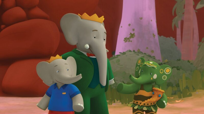 Badou und Babar sind froh. Ayla ist sicher in ihr Tal zurückgekommen und wieder im Besitz der Pfortenpfeife. – Bild: KiKA/​Nelvana Limited/​TeamTO/​TF1