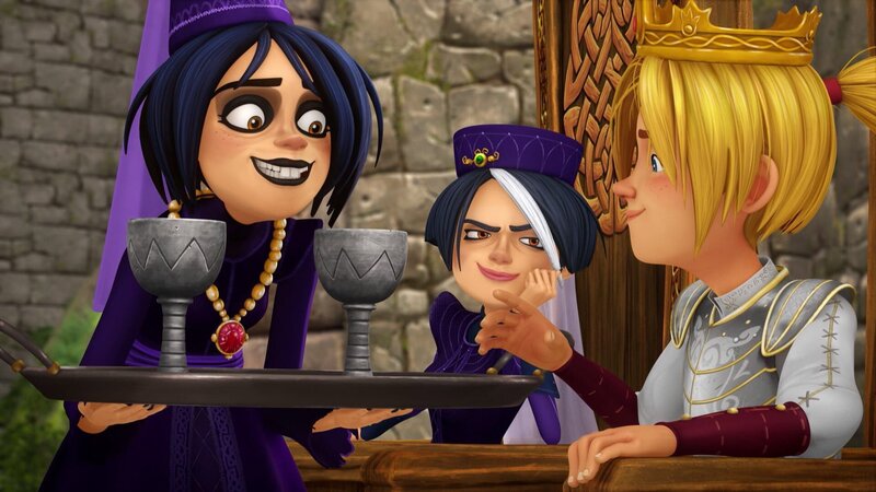 Soll Tristan das Getränk annehmen? Morgause und Igraine versuchen, den frisch gebackenen König auszuschalten. – Bild: SWR/​Blue Spirit Productions/​TéléTOON+/​Canal+