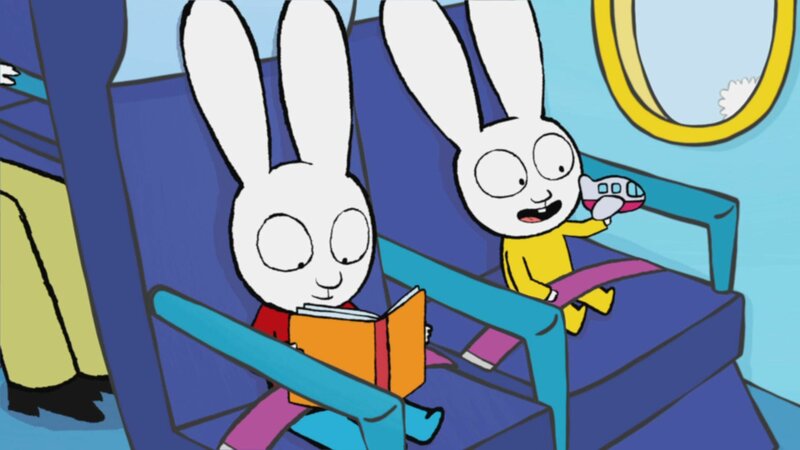 Die Flugzeit überbrücken Simon (l.) und Franz (r.) mit Lesen und Spielen. – Bild: ZDF/​GO-N Productions 2016