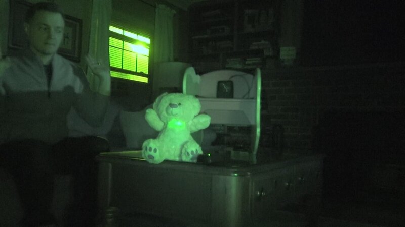 Paranormal investigator Adam Berry reacts to an invisibly triggered talking toy in a private home in Guilderland, NY. – Bild: Travel Channel /​ Discovery Communications, LLC.