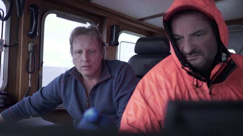 Sig and trusted deckhand, Nick Mavar, figure out where to set pots. – Bild: Discovery Channel /​ Discovery Communications
