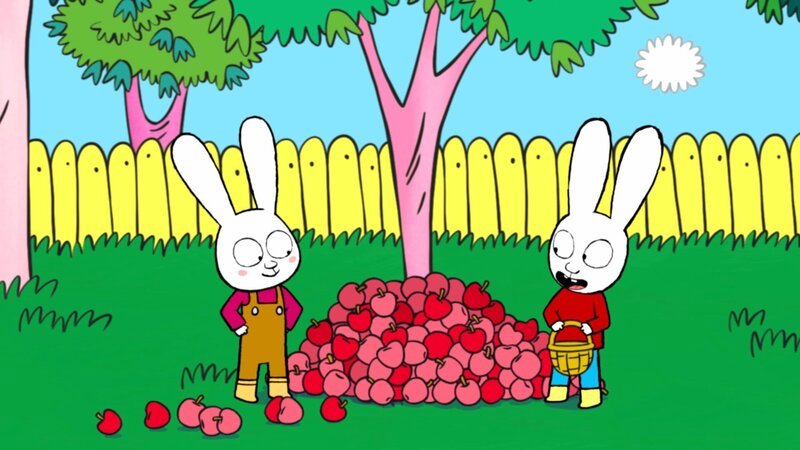 Boris (l.) und Simon (r.) sammeln die frisch gepflückten Äpfel auf. – Bild: GO-N Productions /​ ZDF