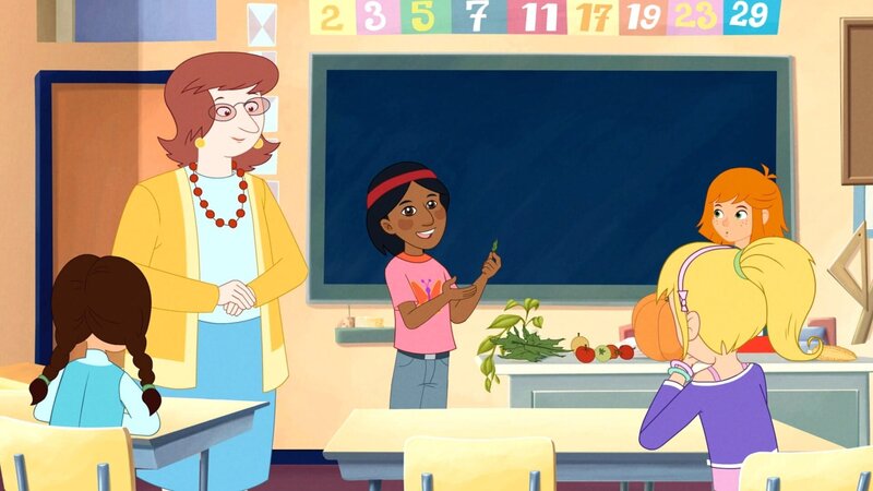 Der Indianerjunge erklärt vor Lillis Klasse Pflanzen. – Bild: ORF/​DOR Film/​Trixter Productions, Vivatoon