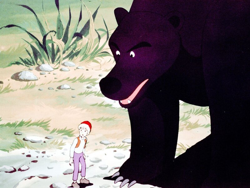 Drohend steht der mächtige Bär vor Nils Holgersson, der gerade auf der Flucht vor dem Fuchs Smirre war. – Bild: ORF/​Apollo Filmverleih