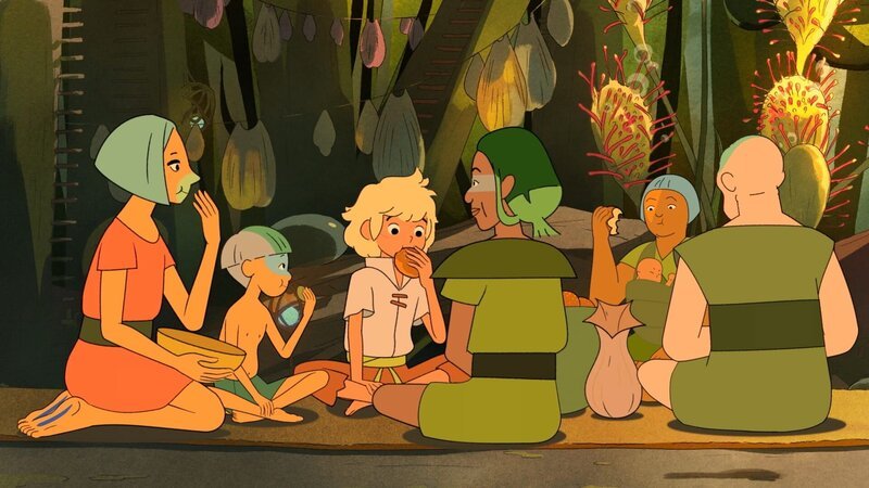 Die Hautlosen, das Volk im Grasland, feiert nach dem Regen ein großes Fest und Tobie (2. v. li.) wird dazu eingeladen. Er hat sogar Brote zubereitet. – Bild: ZDF