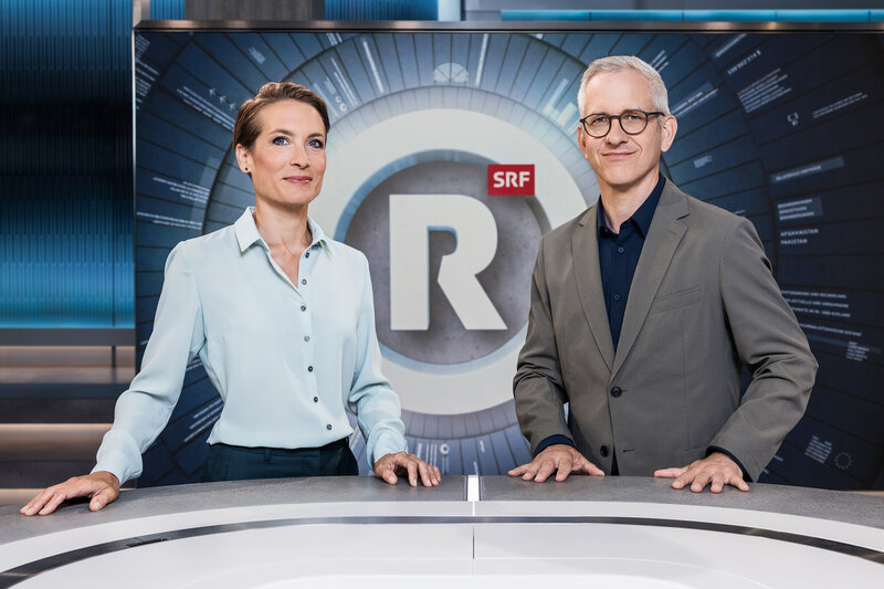 Franziska Ramser und Gion-Duri Vincenz Moderatoren Rundschau – Bild: SRF/​Gian Vaitl