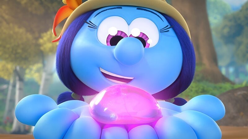 Lily wird von einem verzauberten Kieselstein in den Bann gezogen. – Bild: KiKA/​Peyo Productions, Dupuis Édition & Audiovisuell /​ KiKA