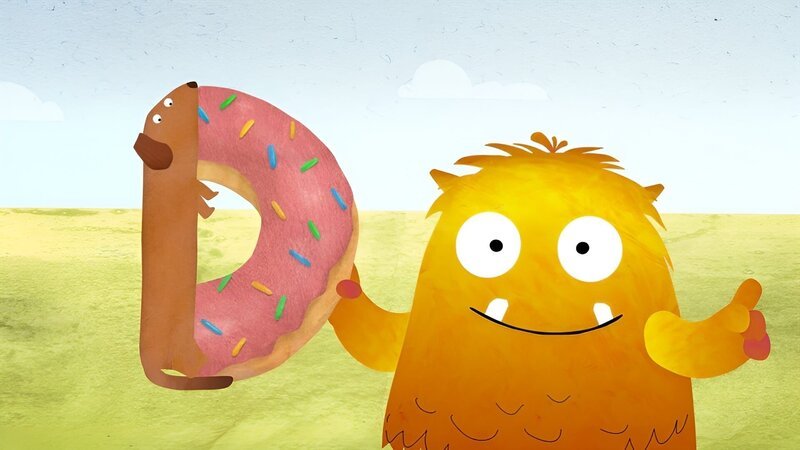 Nitso sucht das D und findet dabei einen Dackel, der von einem Donut abbeißt. – Bild: KiKA/​Filmakademie Baden-Württemberg GmbH/​Eagle Eye
