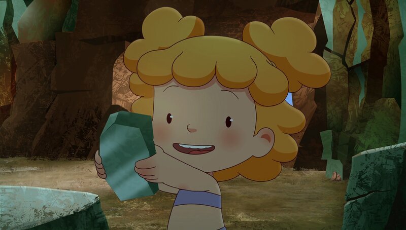 Als Tib Kori und Tara die Höhle zeigt, nimmt Kori sich ein kleines Stückchen eines glänzenden Steines mit. – Bild: KiKA/​hr/​TF1/​GO-N Productions