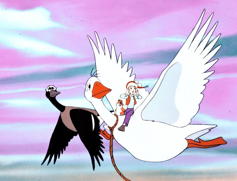 Nils und Krümel fliegen mit Martin, der Hausgans, und der Wildgans Daunenfein in den Süden. – Bild: ORF/​Apollo Filmverleih