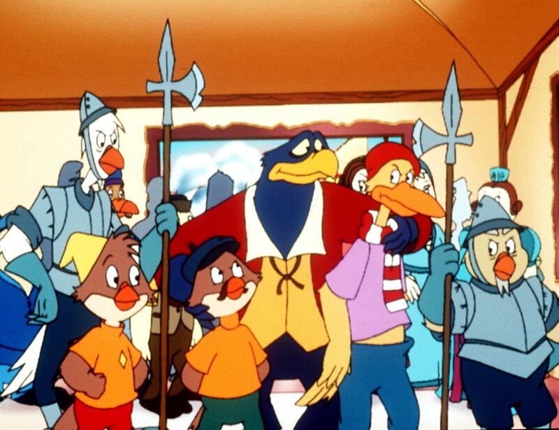 „Die Jagd nach dem Kju Wang“, „Der Doppelgänger.“ Ardelia hat eine nagelneue Schönheitsmaschine und gibt sich ihrer Körperpflege im wahrsten Sinne mit Haut und Haaren hin. Währenddessen treiben sich zwei Ganoven auf dem Marktplatz herum. Titus betätigt sich als Taschendieb, während Tricky die Passanten durch Jongleurskunststücke ablenkt. Yagor beobachtet dies und schmiedet einen teuflischen Plan, der auf einer bestechenden Ähnlichkeit zwischen Tricky und dem Croissantbäcker Marco beruht. Tricky soll im Palast den Kju Wang klauen, während der Verdacht auf Marco fällt. Fast hätte es diesmal geklappt. – Bild: ORF/​EBU