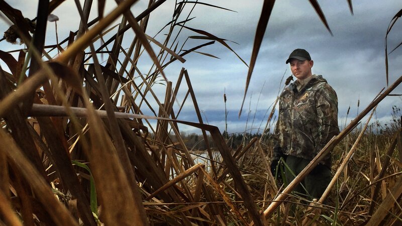 Officer Kimball in a field. – Bild: Animal Planet /​ Discovery Communications