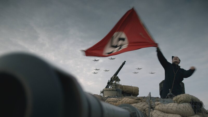 Stukkas flying over Karl Fuchs in his Panzer Tank. (Photo credit: DSP) – Bild: The National Geographic Channel
