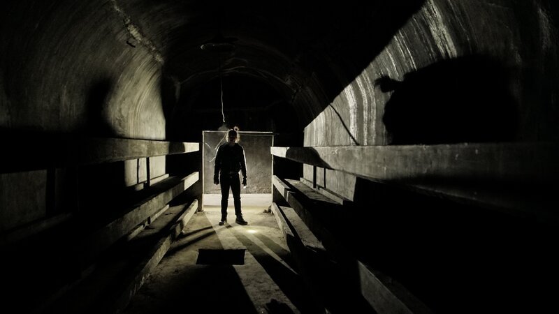 HARBIN, CHINA – Robert Joe shines a light to explore the ruined buildings of Unit 731, once part of a vast complex of 150 buildings covering 6 square kilometers, where top scientists of Imperial Japan undertook research into deadly weapons. – Bild: The National Geographic Channel