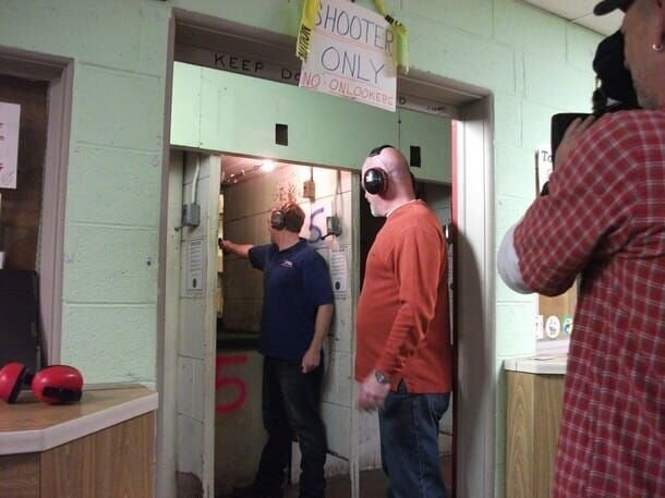 Tom Ross (Armourer) and Alex Cranmer test fire a confederate revolver at a test range. – Bild: National Geographic Society