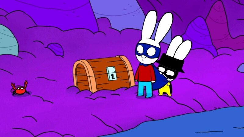 Superhase (l.) und Captain Hase (r.) stehen vor einer Höhle, in der die Schatztruhe liegt. – Bild: ZDF und GO-N Productions