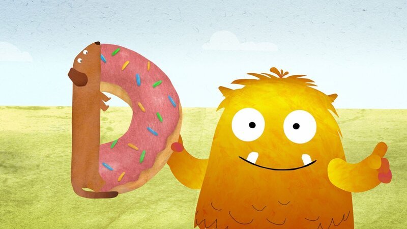Nitso sucht das D und findet dabei einen Dackel, der von einem Donut abbeißt. – Bild: KiKA/​Filmakademie Baden-Württemberg GmbH/​Eagle Eye