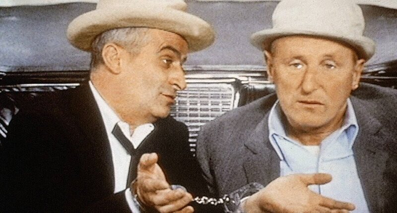 Voellig ahnungslos erfaehrt der kleine Angestellte Antoine (re.), dass er von dem schwerreichen Industriellen Saroyan nur benutzt wurde. – Bild: KinoweltTV Voellig ahnungslos erfaehrt der kleine Angestellte Antoine (re.), dass er von dem schwerreichen Industriellen Saroyan nur benutzt wurde. – Bild: KinoweltTV