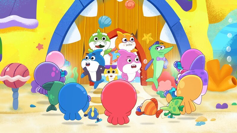 Hinter: Daddy Shark (l.), Grandpa Shark (2.v.l.), Baby Shark (3.v.l.), Grandma Shark (3.v.r.), Mommy Shark (2.v.r.) – Bild: Paramount
