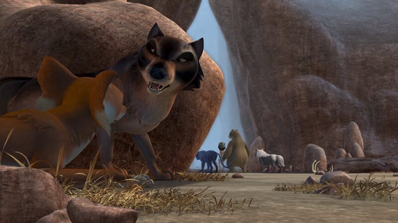 Phaona und Tabaqui besprechen noch ihren Plan, während Mogli sich von Balu, Baghira und Akela am Eingang des Tals verabschiedet. – Bild: ZDF/​DQ Entertainment