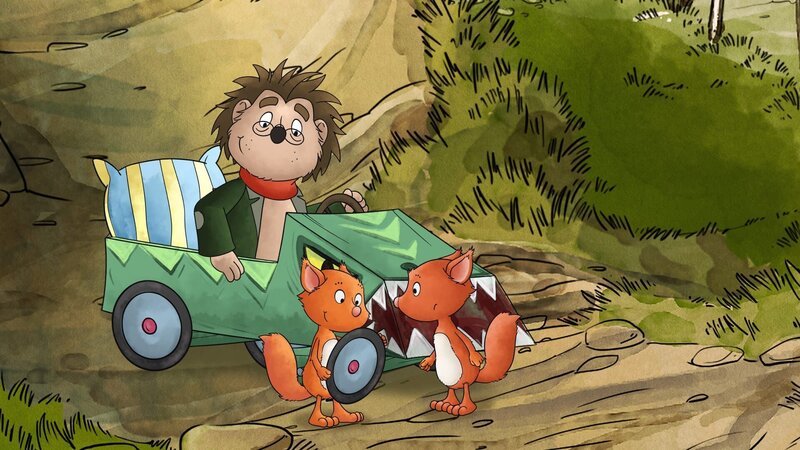 Billy und Benny sind begeistert: Rupert hat für sie eine Seifenkiste gebaut. – Bild: KiKA/​Mideu Films