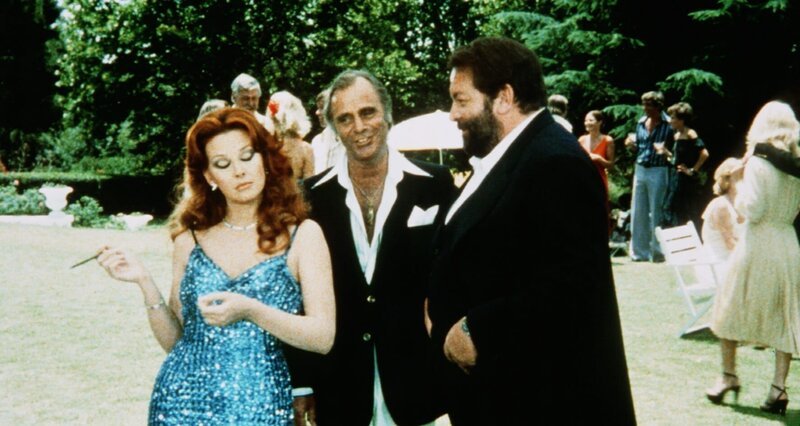 Dagmar Lassander als Margy, Joe Stewardson als Klein Smollet (M.), Bud Spencer als Rizzo ‚Piedone‘ (r.) – Bild: Kabel Eins Classics Dagmar Lassander als Margy, Joe Stewardson als Klein Smollet (M.), Bud Spencer als Rizzo ‚Piedone‘ (r.) – Bild: Kabel Eins Classics