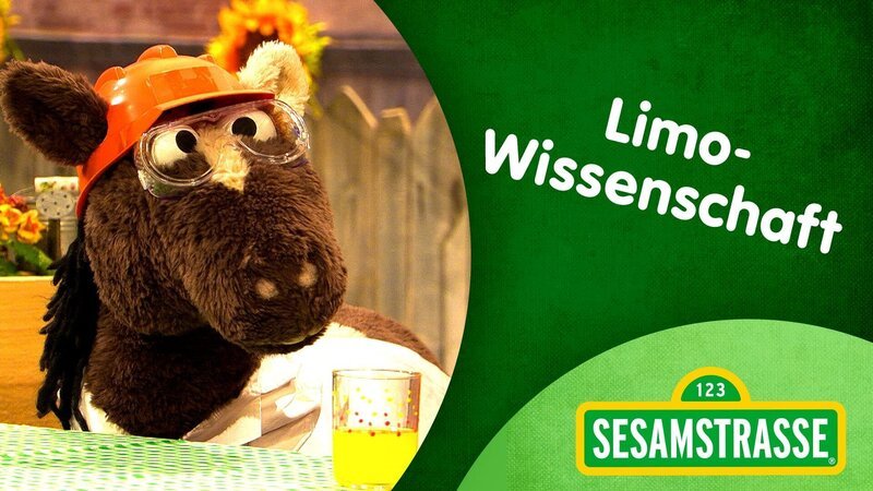 Pferd und Elmo streiten sich über die gerechte Aufteilung ihrer Limo. – Bild: NDR/​Studio Hamburg Produktion/​Sesame workshop