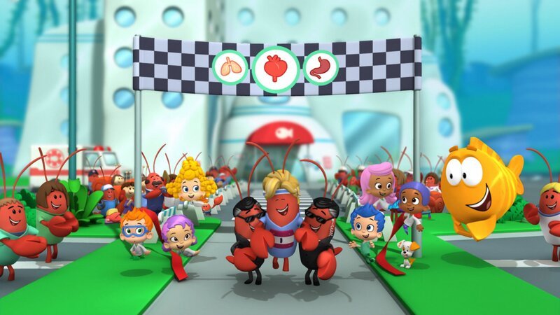 Vorne: Nonny (3.v.l.), Oona (4.v.l.), Deema (5.v.l.), Lobster Body Guards, The Mayor (m.), Gil (6.v.r.), Molly (5.v.r.), Bubble Puppy (4.v.r.), Goby (3.v.r.), Mr. Grouper (2.v.r.). – Bild: Paramount