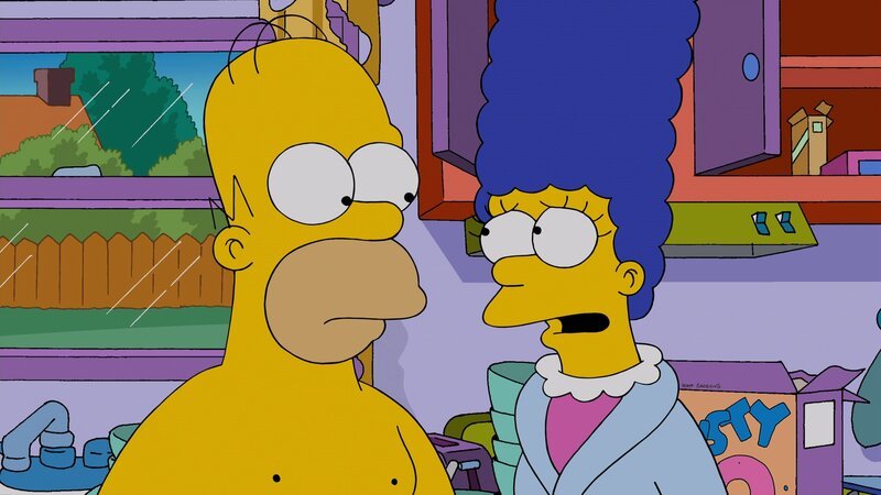 Marge (r.) macht sich große Sorgen um Homer (l.), weil er so ungesund lebt, und redet ihm immer wieder ins Gewissen. Obwohl Homer gelobt, sich zu bessern, kann er doch nicht anders, als seinen Lebensstil mit Bier, Chips und Fernsehen weiterzuführen … – Bild: 2013 Twentieth Century Fox Film Corporation. All rights reserved.