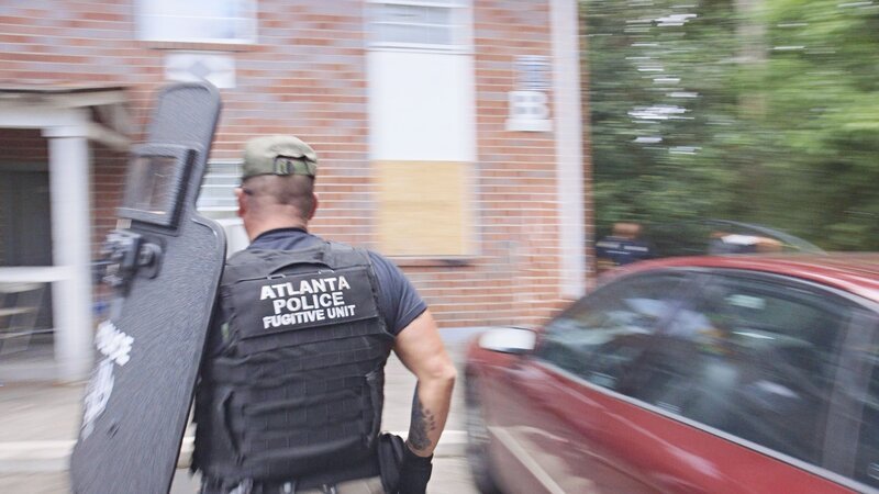 Mitglied der Einheit für flüchtige Personen der Polizei von Atlanta – Bild: Crime + Investigation /​ A+E Networks