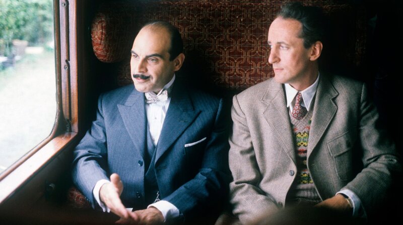 Hercule Poirot und Captain Hastings. – Bild: WDR/​ITV plc (Granada International)