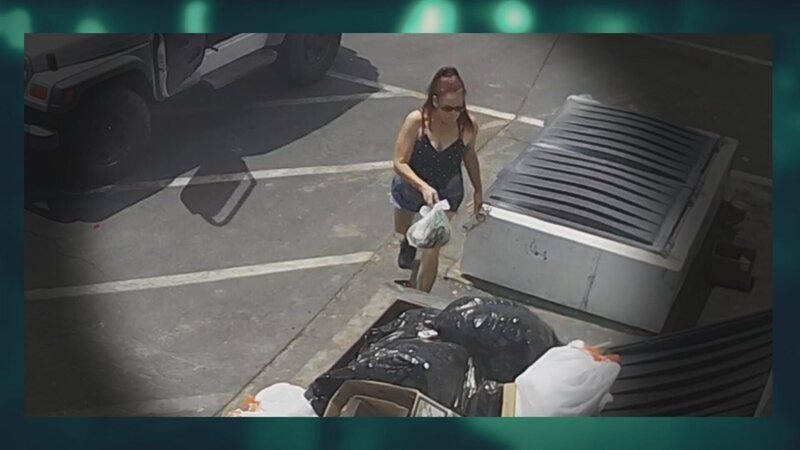 Deborah Culwell throwing bag of puppies into a dumpster – Bild: Lion Television, LLC.