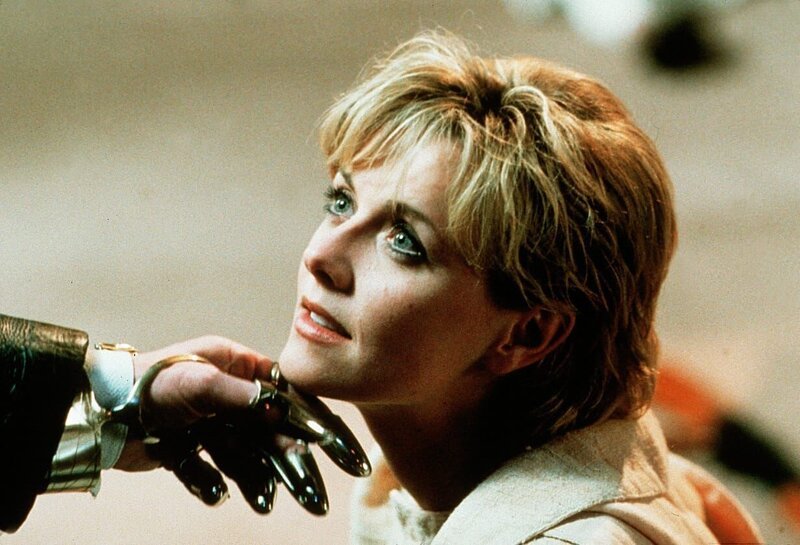 Carter (Amanda Tapping) berichtet Seth wie in Trance, dass die Tokra sie geschickt haben. Seth ist ausser sich … – Bild: RTL II